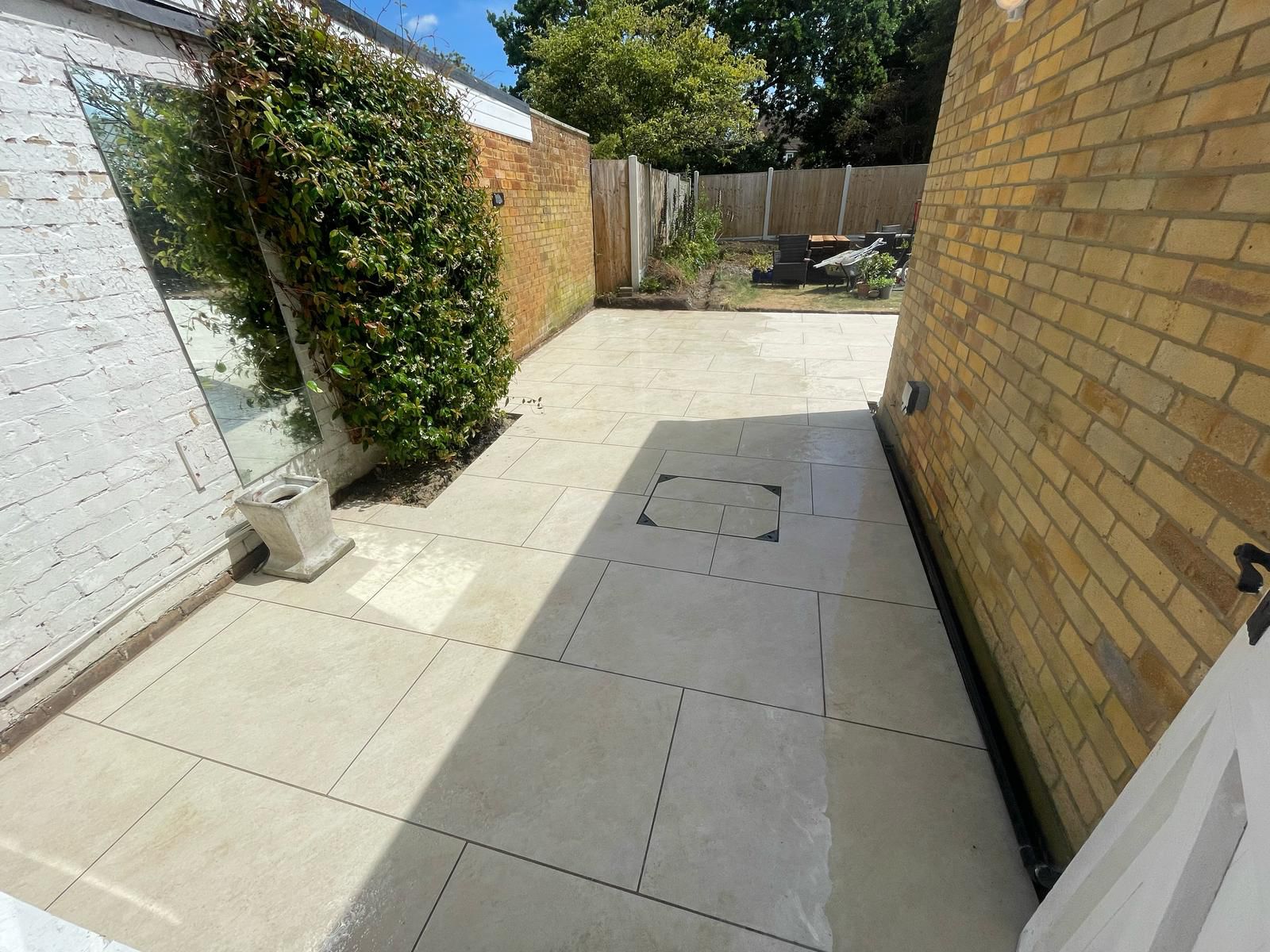 Porcelain paving patio laid in Essex by Andy Harragan & Sons