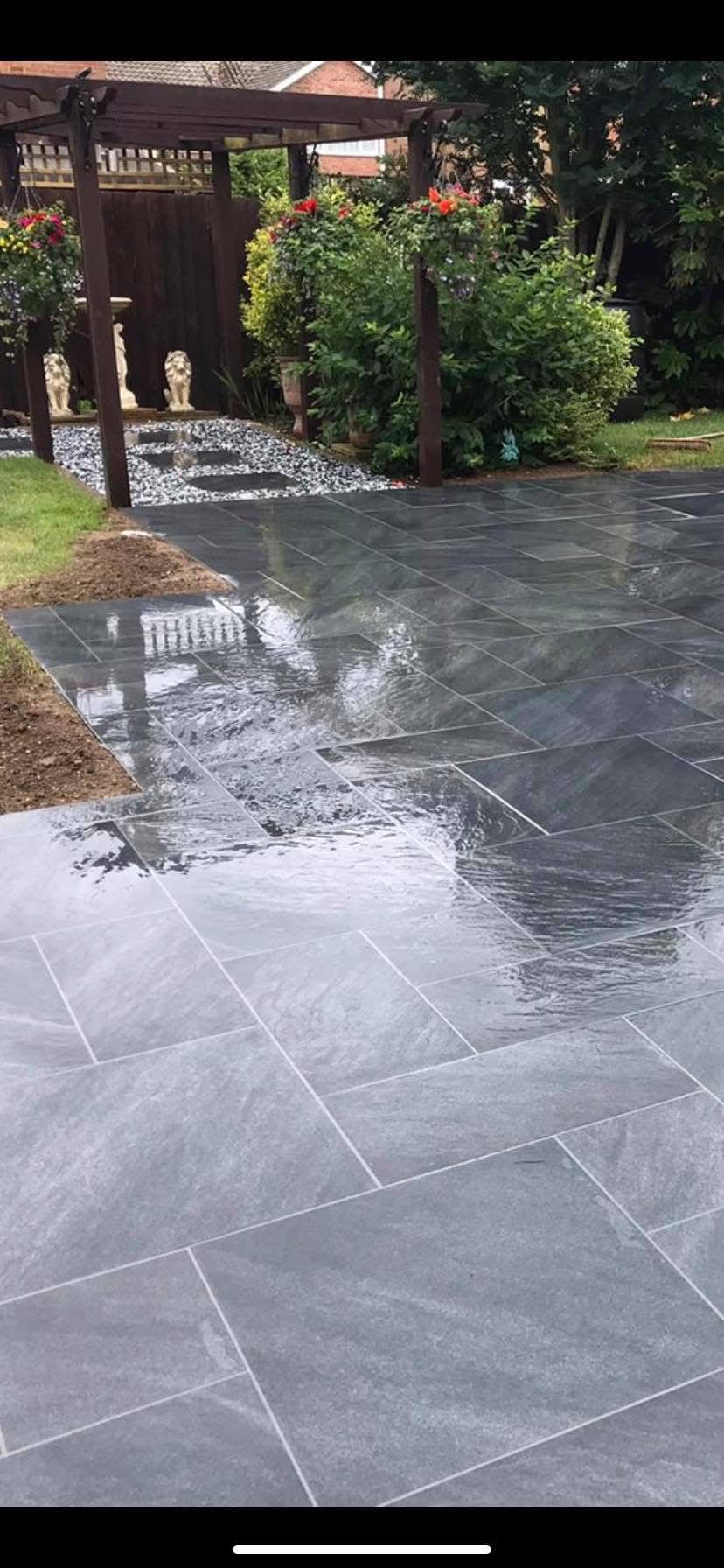 Porcelain paving patio laid in Essex by Andy Harragan & Sons
