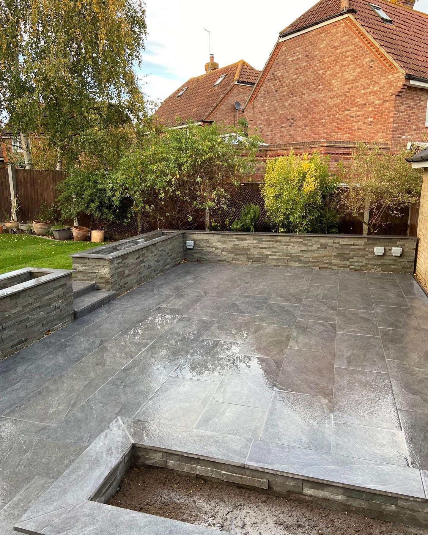 Porcelain paving patio laid in Essex by Andy Harragan & Sons